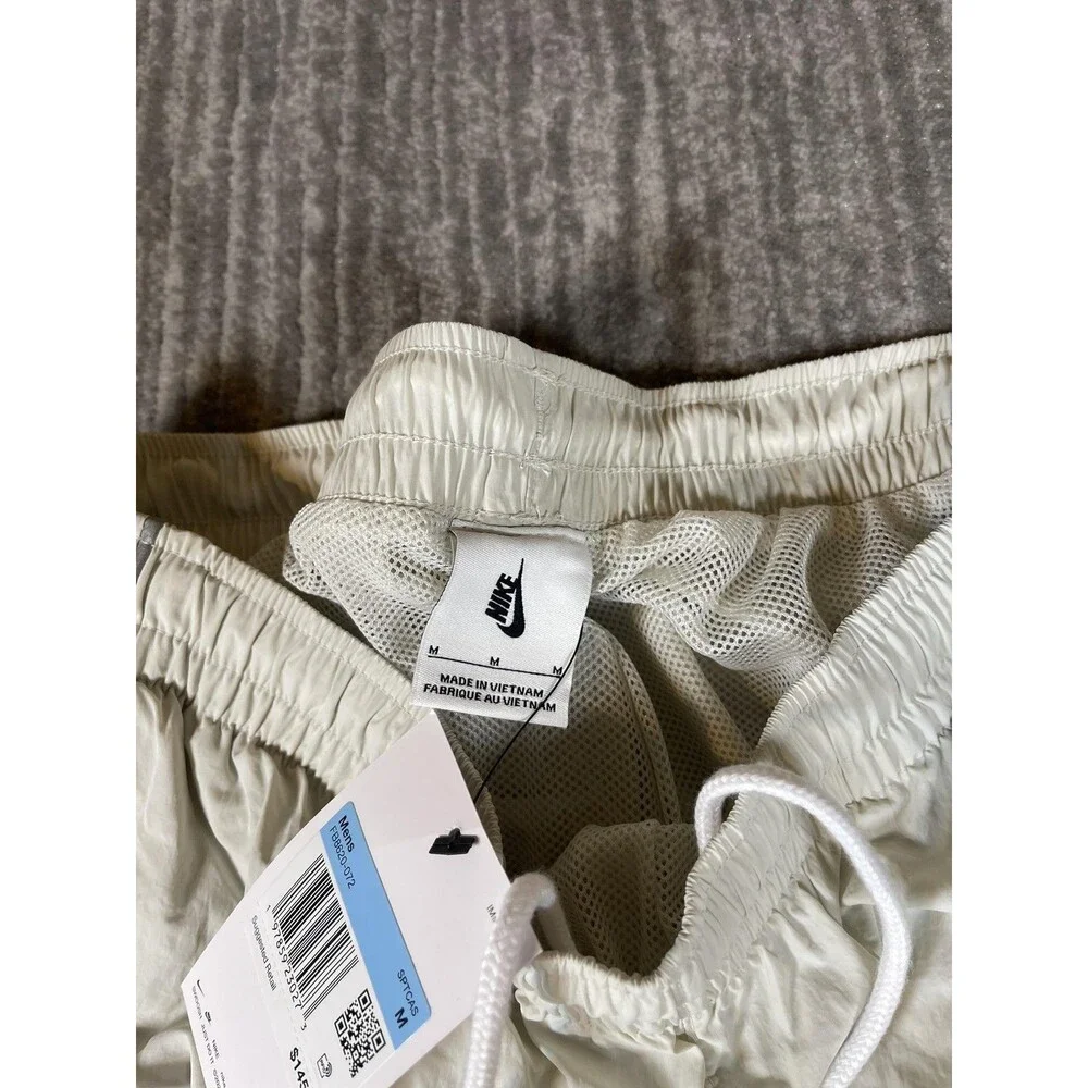 Nike Track Pants Mens Medium White Solo Swoosh Loose Fit Taper Leg Stacked New
